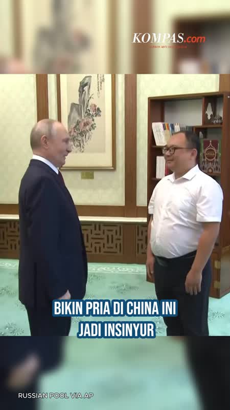 Pria Di China Jadi Insinyur Gara-gara Pernah Foto Bareng Putin