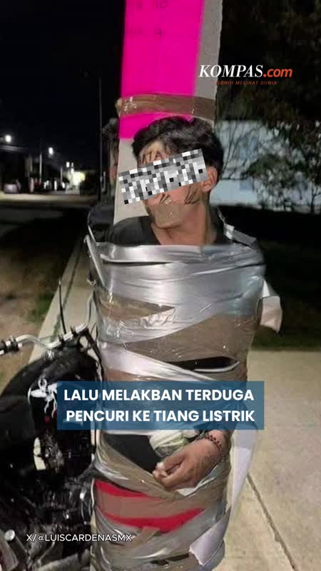 "Batman" Meksiko Tangkap Maling Lalu Dilakban Ke Tiang Listrik